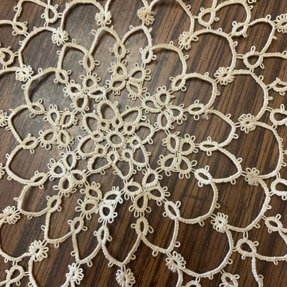 Hand tatting. Intricate Cream Lace Doily